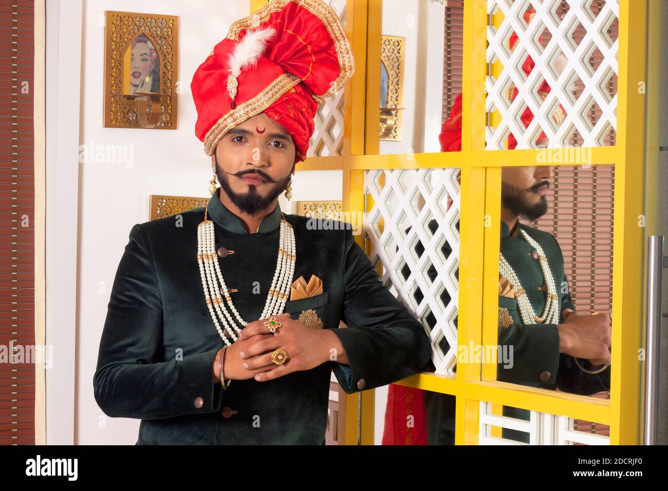 Young bearded man in traditional Indian attire and red turban Stock ...