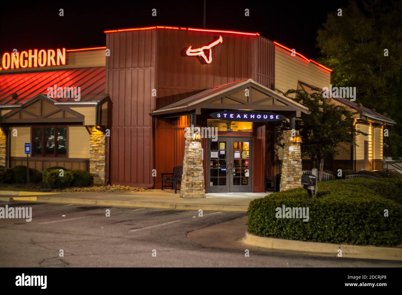North Augusta, SC / USA - 11 20 20: LongHorn Steakhouse Restaurant entrance at night Stock Photo