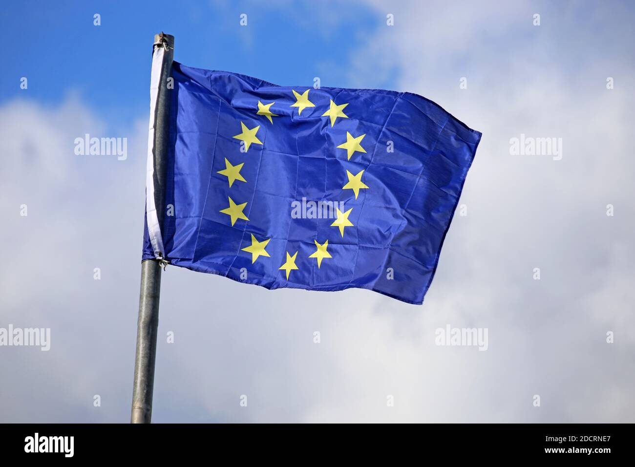 Flag of the European Union in front of a blue blue sky Stock Photo - Alamy