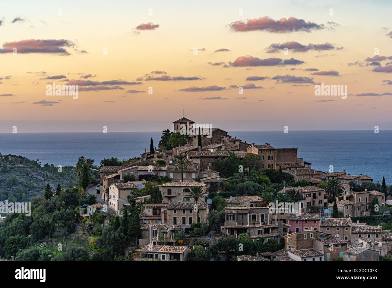 Beautiful view of the town of Deia, located in the Sierra de Tramuntana, a world heritage site, in Mallorca, Spain. Stock Photo