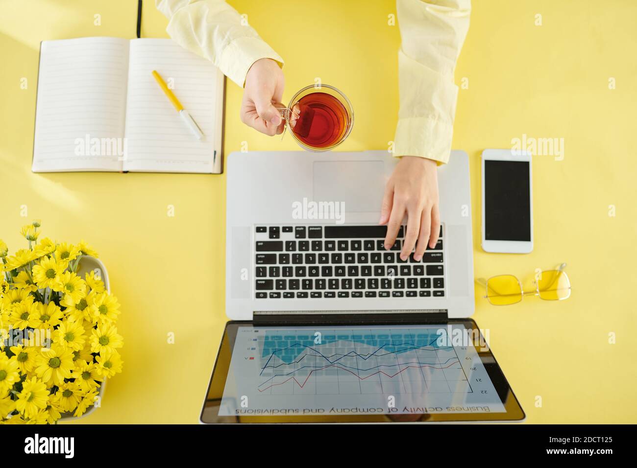 Lady drinking tea with office hi-res stock photography and images - Alamy