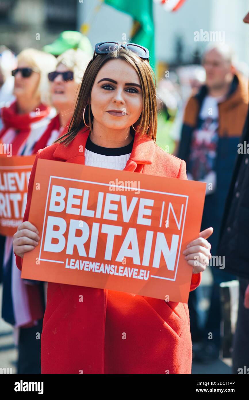 GREAT BRITAIN / England / London /Female protester with sign' Belive in Britain 'protesting for brexit. Stock Photo