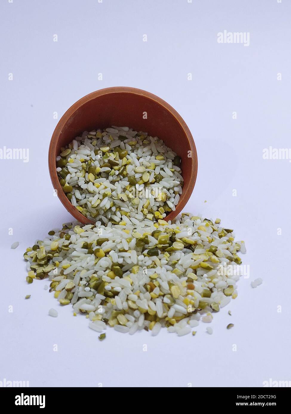 Different grains in the bowl, rice, moong beans, dal, mung dal, lentils, khichdi, khichadi, selective focus Stock Photo