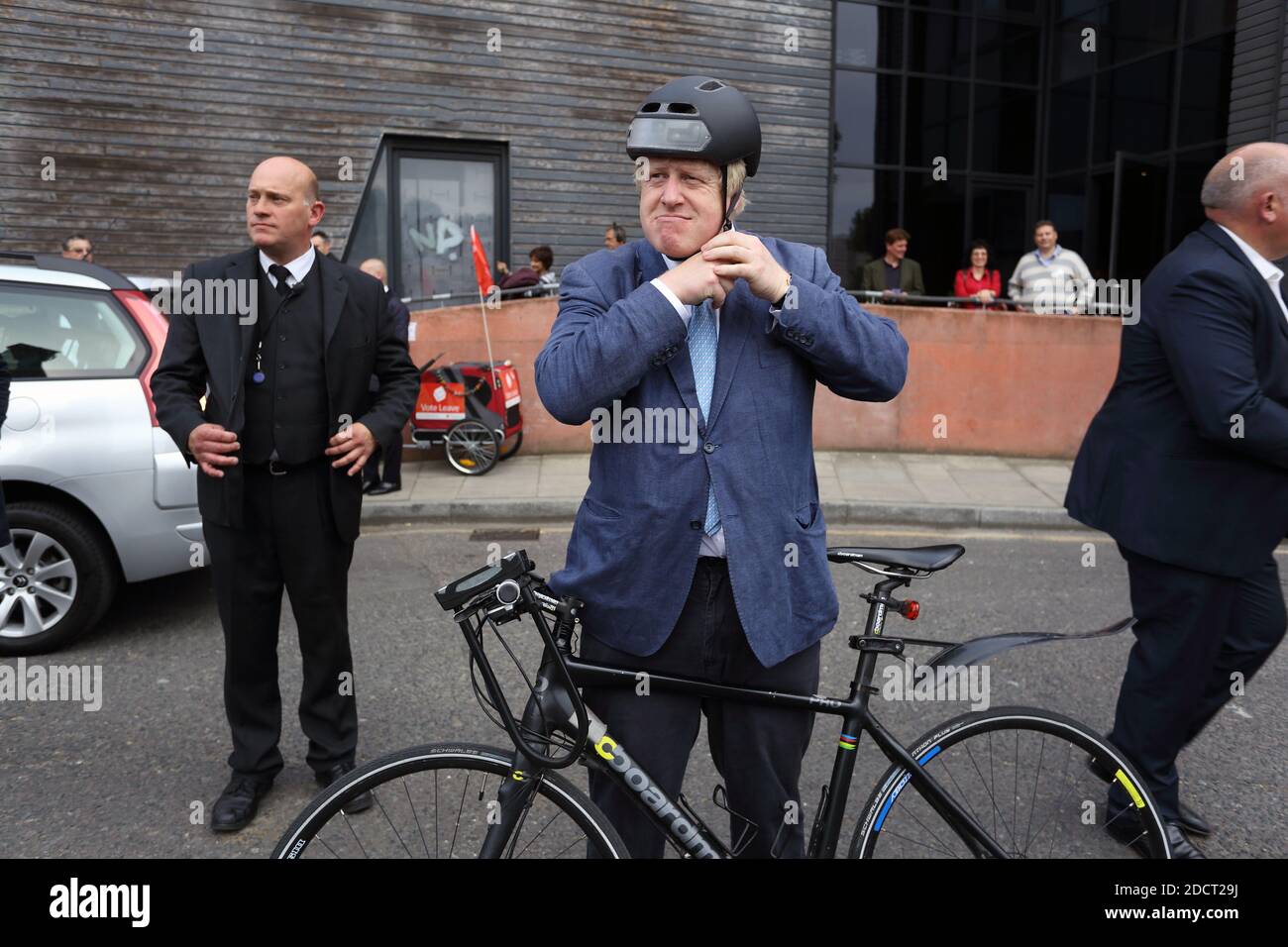 Great Britain /London /Vote Leave Rally in East London .Boris Johnson leaving with his bicycle . Stock Photo