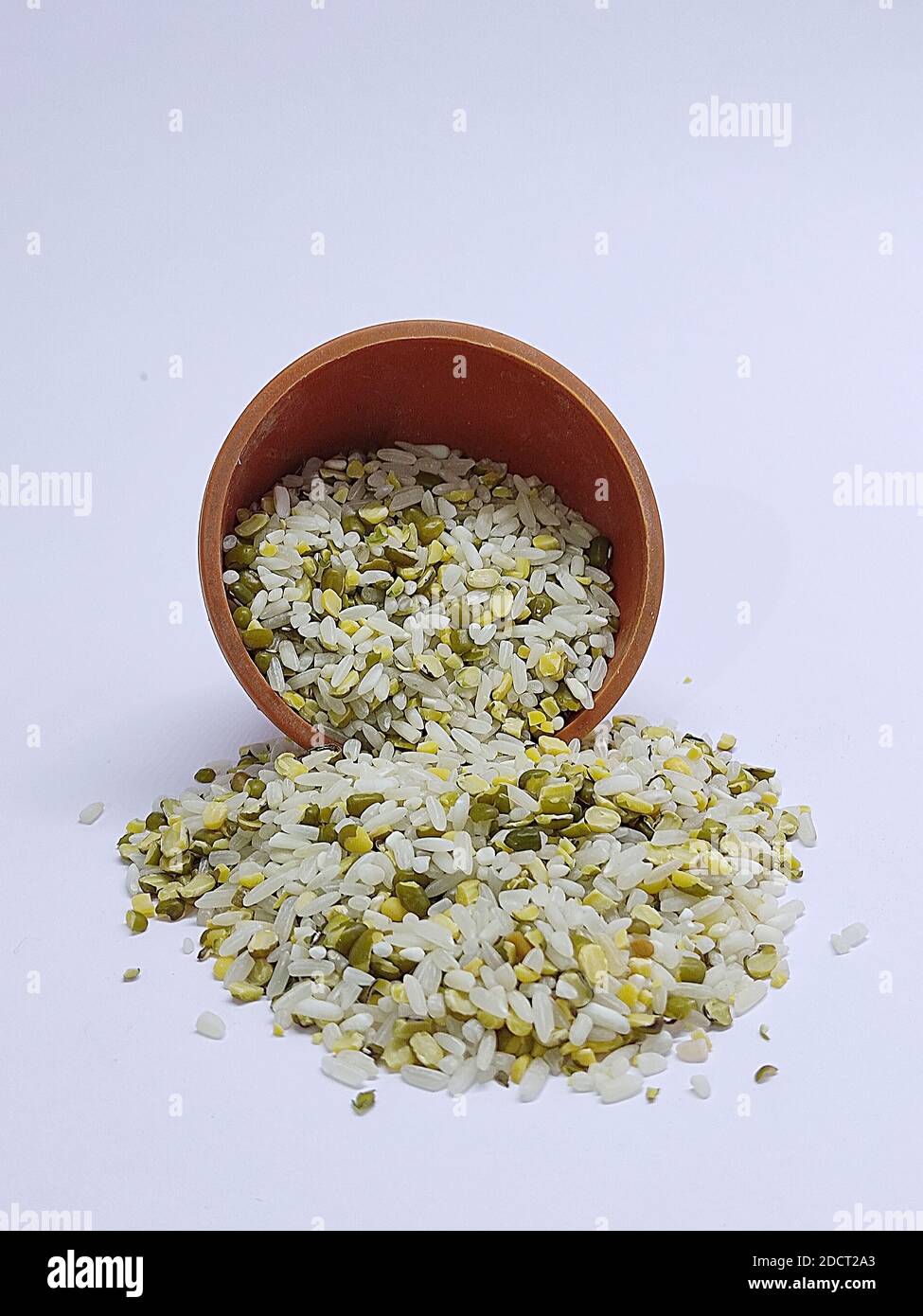 Different grains in the bowl, rice, moong beans, dal, mung dal, lentils, khichdi, khichadi, selective focus Stock Photo