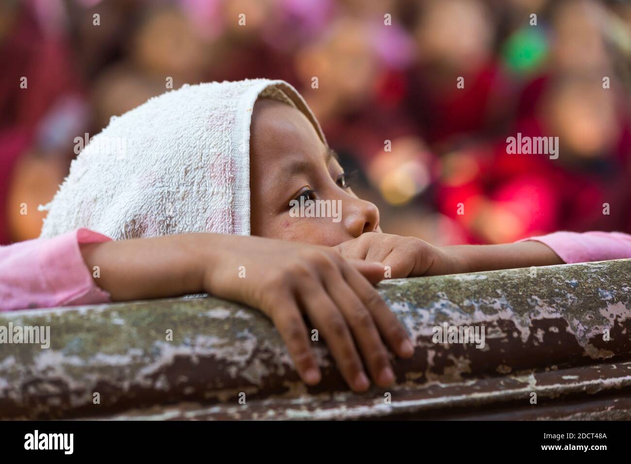 Young girl at Aung Myae Oo Monastic Free Education School, Sagaing, Mandalay, Myanmar (Burma), Asia in February Stock Photo