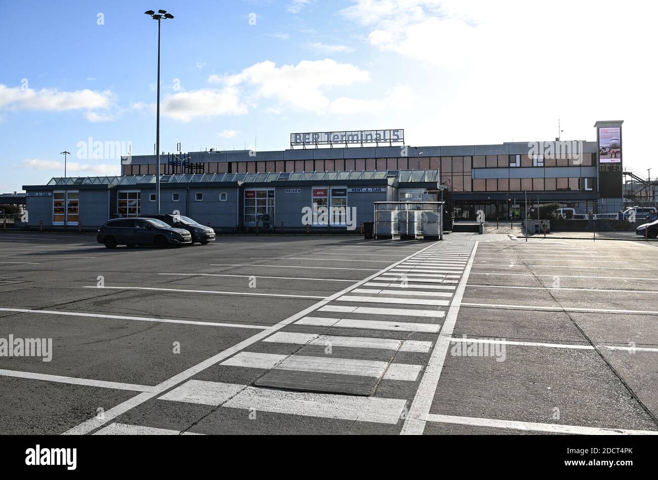 23 November 2020, Berlin, Schönefeld: A car park in front of Terminal 5 at BER Airport. The airport company plans to close the old terminal building in Schönefeld. The airport, formerly abbreviated as SXF, has been trading as Terminal 5 of BER since the opening of the new airport. Photo: Britta Pedersen/dpa-Zentralbild/dpa Stock Photo