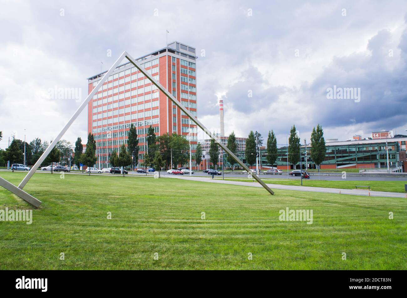 The Bata's Skyscraper, also known as Building No. 21, designed by architect  Vladimir Karfik, and in front of it there is Big Fibonacci sculpture by ar  Stock Photo - Alamy