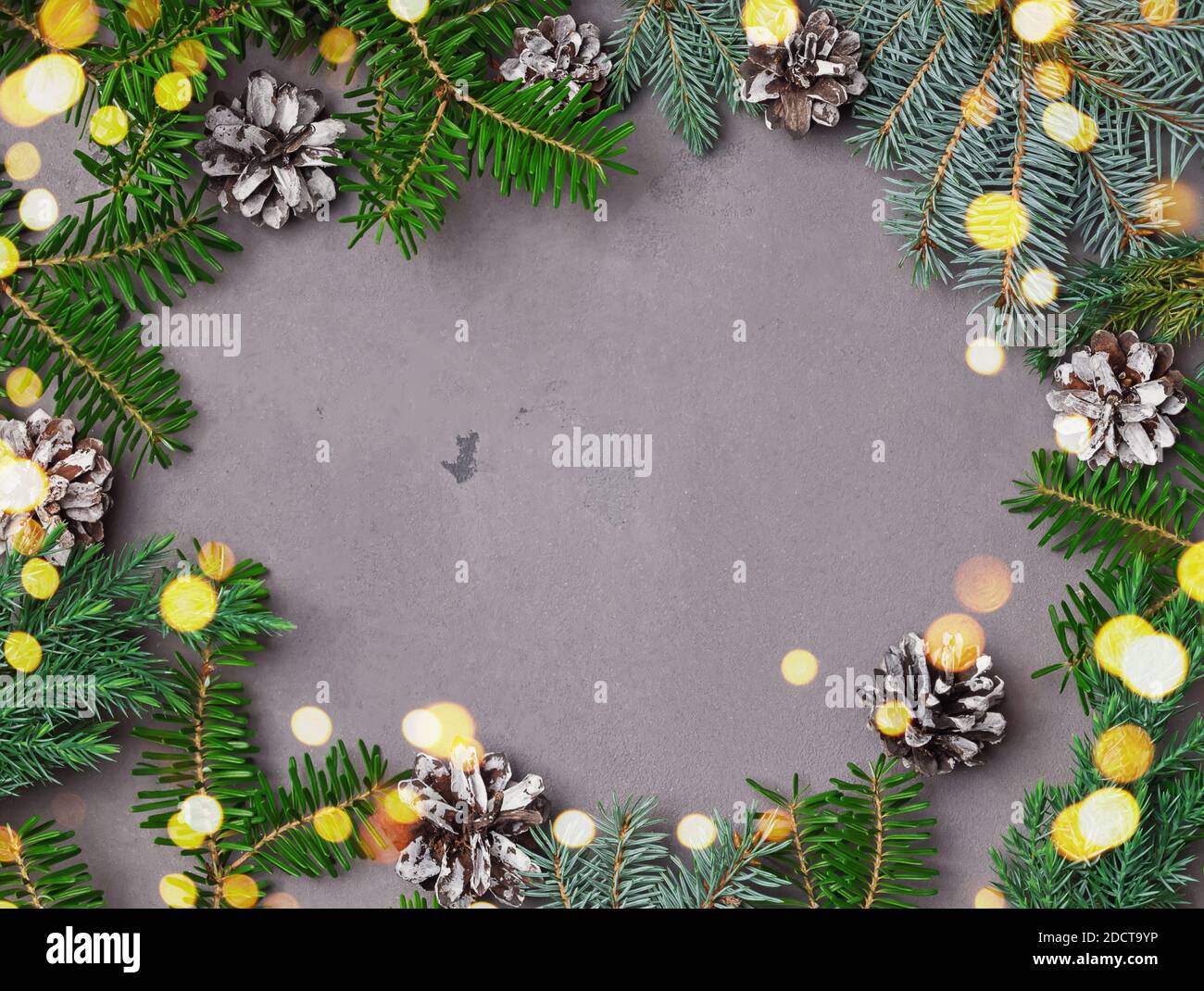 Christmas frame with fir branches and blurred lights Stock Photo - Alamy