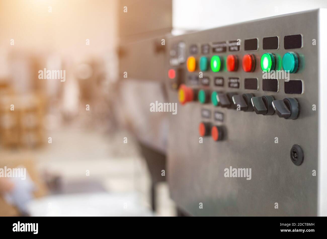 Machine Control Buttons Text Design Control panel with multi-colored buttons to control production ...