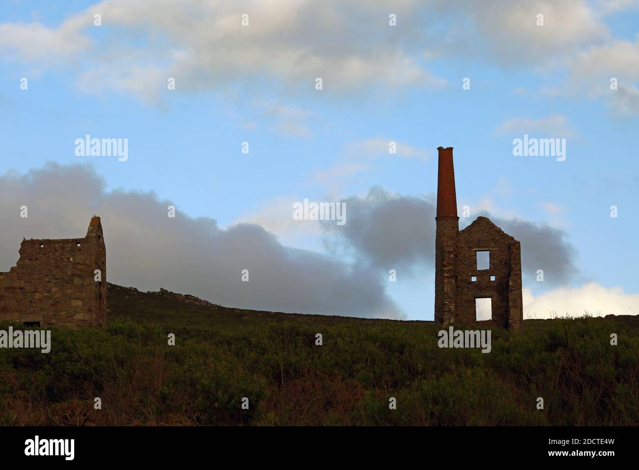 The ruins of Carn Galver Mine on the coast at during sunset near Penwith Cornwall England. Stock Photo