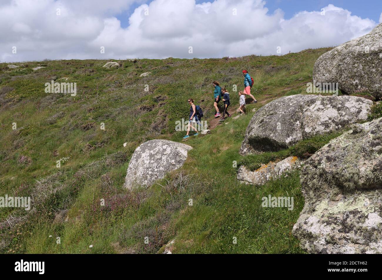 GREAT BRITAIN /Cornwall/ People walking on the South West Coast Path near Porthcurno. Stock Photo