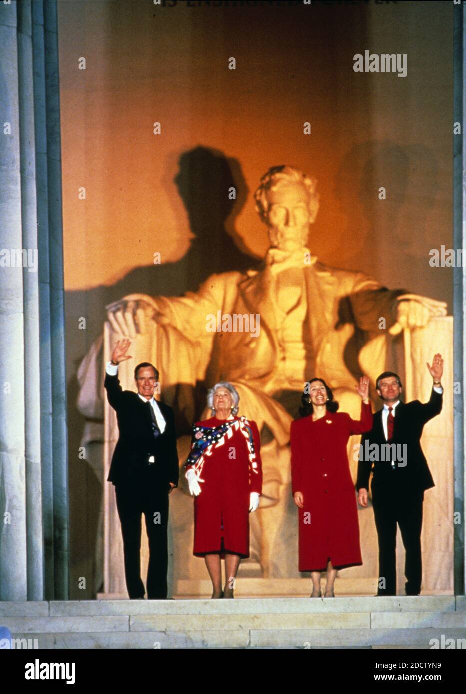 United States President-elect George H.W. Bush attends the opening ceremony for his inauguration at the Lincoln Memorial in Washington, DC on January 18 1989. From left to right: President-elect Bush, Barbara Bush, Marilyn Quayle, and US Vice President-elect Dan Quayle.Credit: Robert Trippett / Pool via CNP /ABACAPRESS.COM Stock Photo
