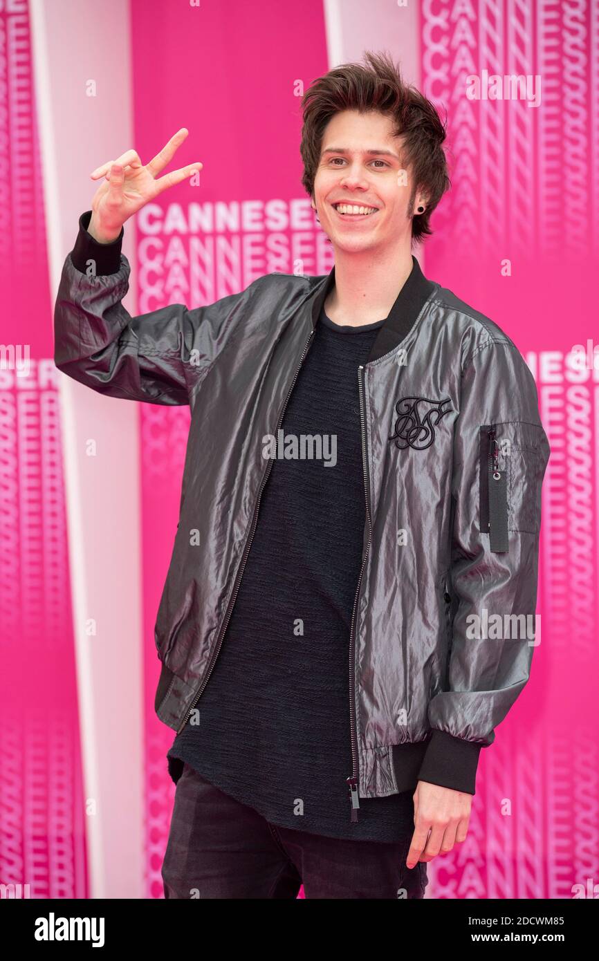 Spanish You-tuber El Rubius poses along the pink carpet for the opening of  MIPTV 2018 and the screening of 'Miguel' and 'Undercover' during  Canneseries 2018 at the Palais du Festival in Cannes (