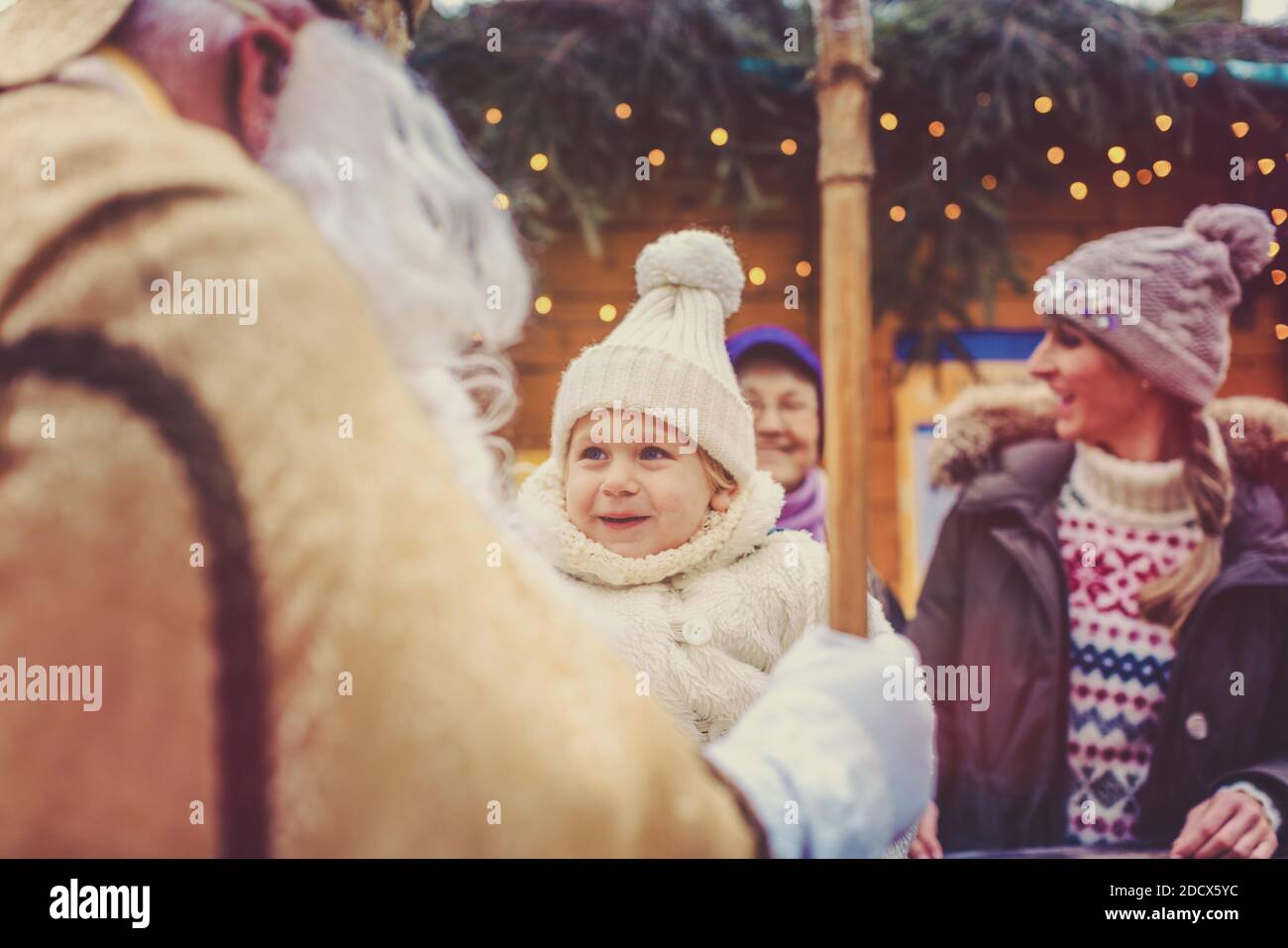 St Nikolaus and an extended family on the Christmas market Stock Photo