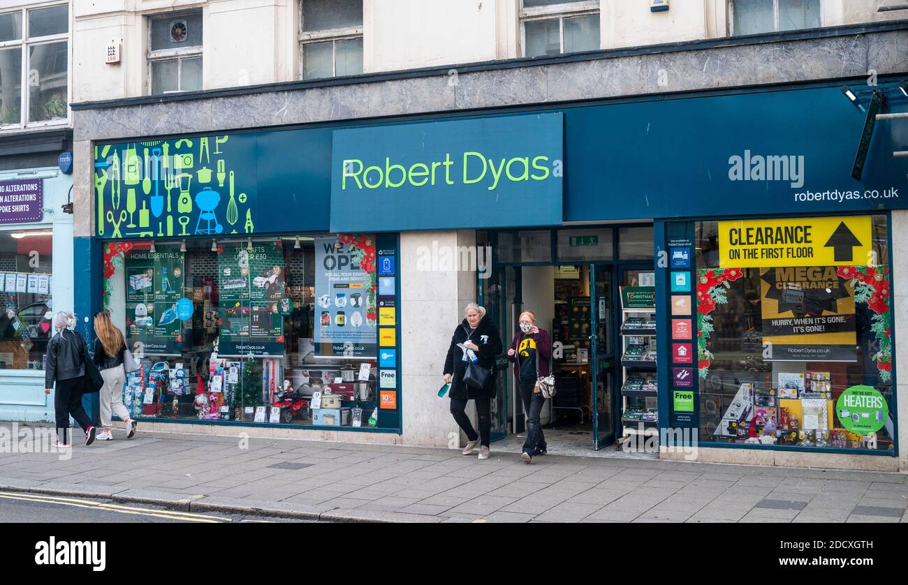 Brighton UK 23rd November 2020 - Shoppers leave the Robert Dyas shop Western Road Brighton which is still open at the moment during the Lockdown Two restrictions in England . The government is expected to open up non essential shops next week when they ease the restrictions in England : Credit Simon Dack / Alamy Live News Stock Photo