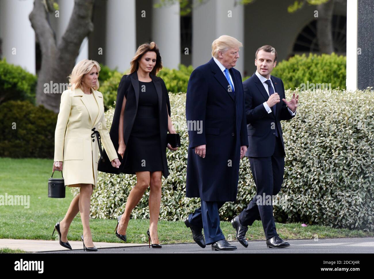 U.S President Donald Trump and First Lady Melania Trump join French President Emmanuel Macron and his wife Brigitte Macron to plant on the South Lawn of the White House a tree that the Macrons provided as a gift, a European Sessile Oak April 23, 2018 in Washington D.C . Photo by Olivier Douliery/ABACAPPRESS.COM Stock Photo