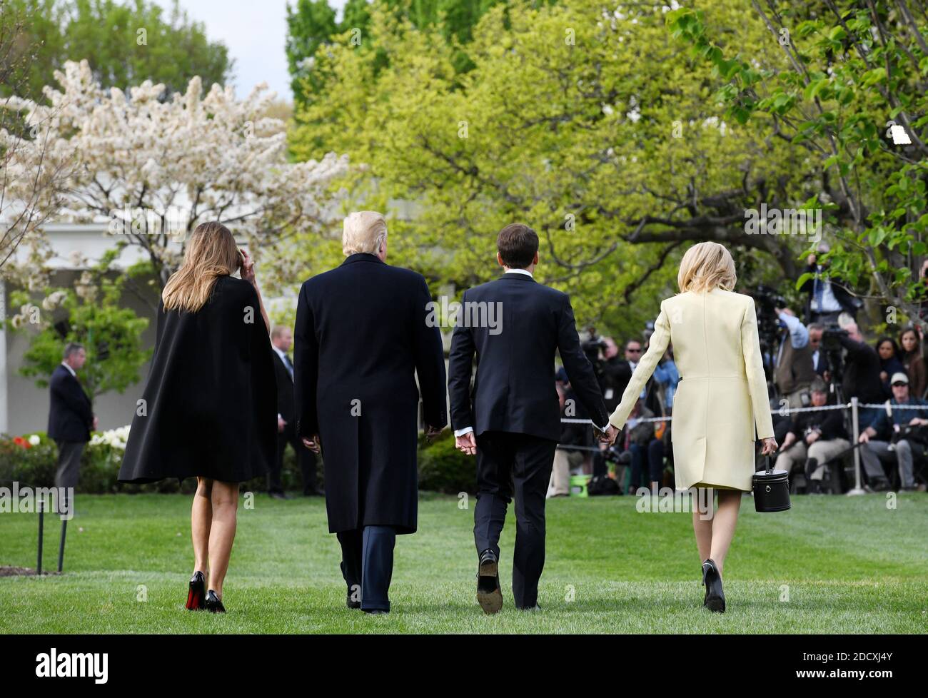 U.S President Donald Trump and First Lady Melania Trump walk with French President Emmanuel Macron and his wife Brigitte Macron on the South Lawn of the White House April 23, 2018 in Washington D.C . Photo by Olivier Douliery/ABACAPPRESS.COM Stock Photo