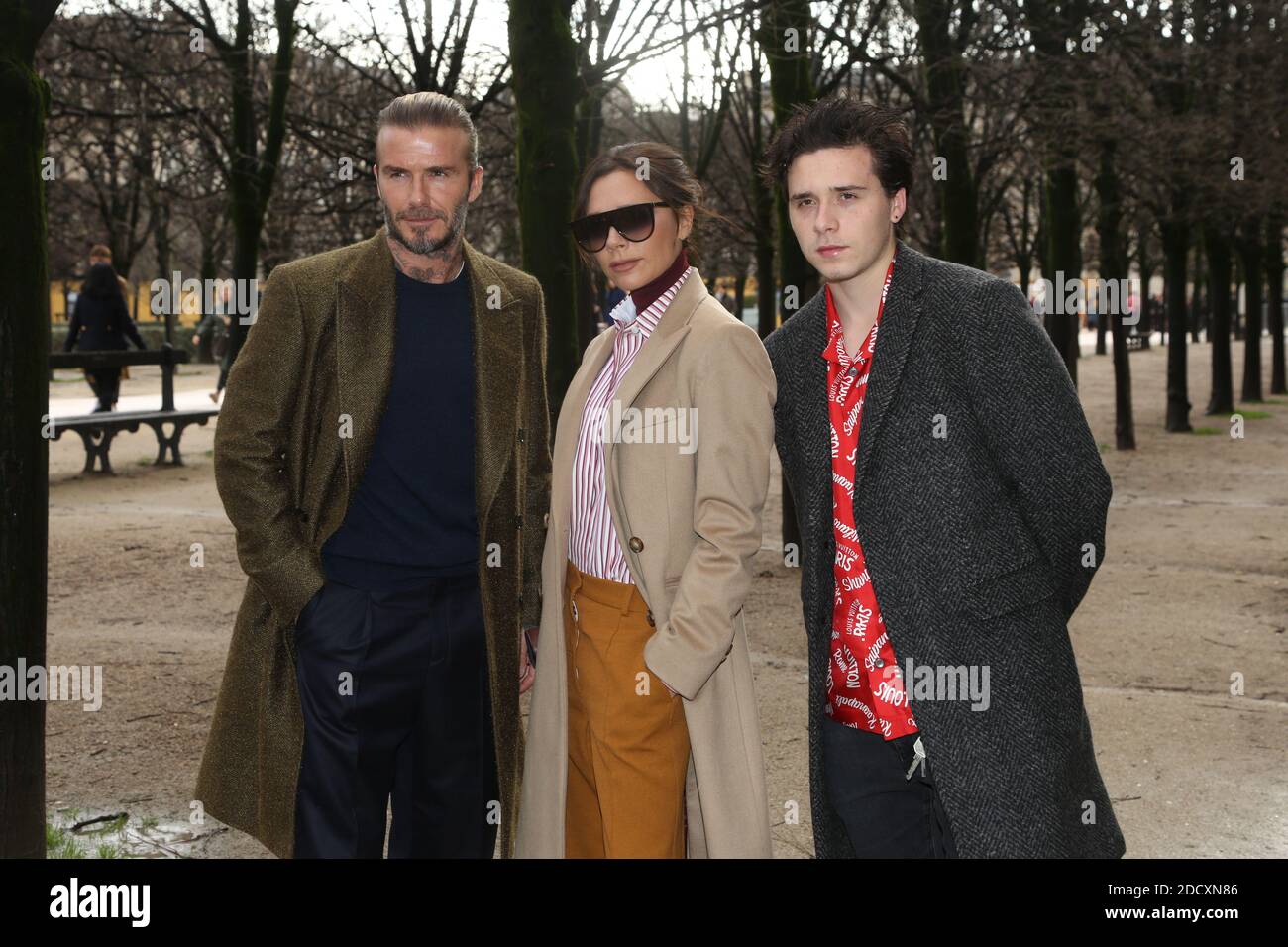 David Beckham, Victoria Beckham and Brooklyn Beckham attending the Louis  Vuitton Men Menswear Fall/Winter 2018-2019 show as part of Paris fashion  week in Paris, France on January 18, 2018. Photo by Jerome