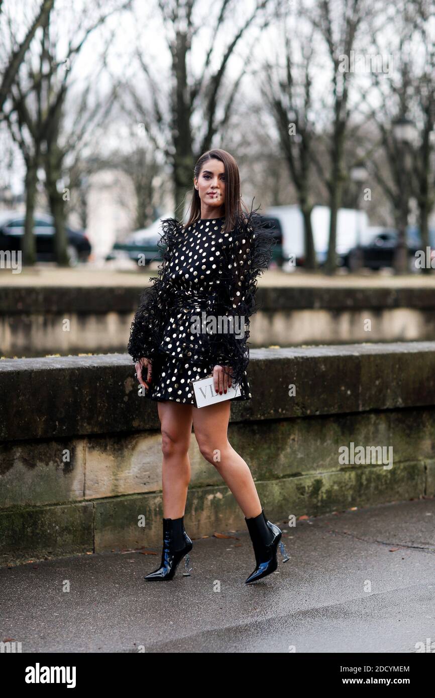 Camila Coelho in Miu Miu (dress and corduroy jacket) on the way to the  brand's runway show at Paris Fashion Week.