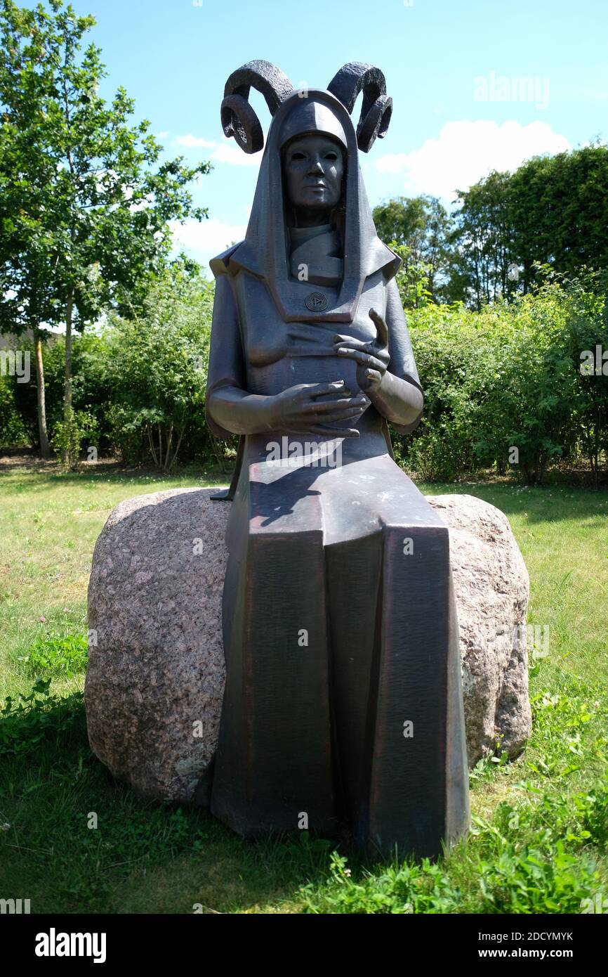 Werdandi (Norse: Verðandi), goddess of the present, 'the one who becomes', sculpture on Dorfplatz, Althüttendorf, Barnim, Brandenburg, German Stock Photo