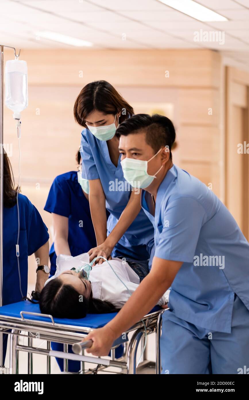 Close up Medical team do CPR to seriously injured patient with oxygen