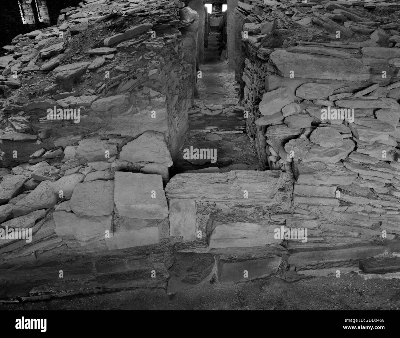 View NW of Midhowe Neolithic chambered cairn, Orkney, Scotland, UK, showing the blocked entrance passage leading to a long rectangular burial chamber. Stock Photo