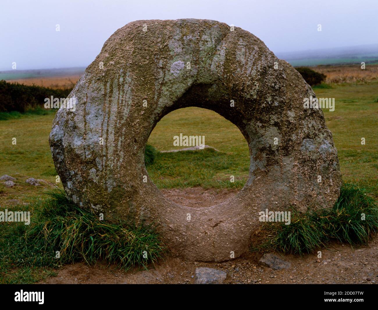 View WSW of Men an Tol holed stone, Bosullow Common, West Penwith, Cornwall, England, UK, associated with folklore, healing rituals and divination. Stock Photo