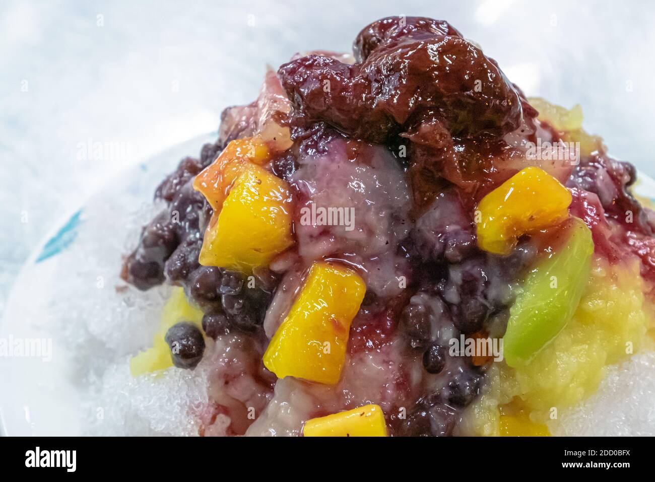 The Close Up Of Taiwanese Mixed Fruit Shaved Ice Snowflake Smoothie At