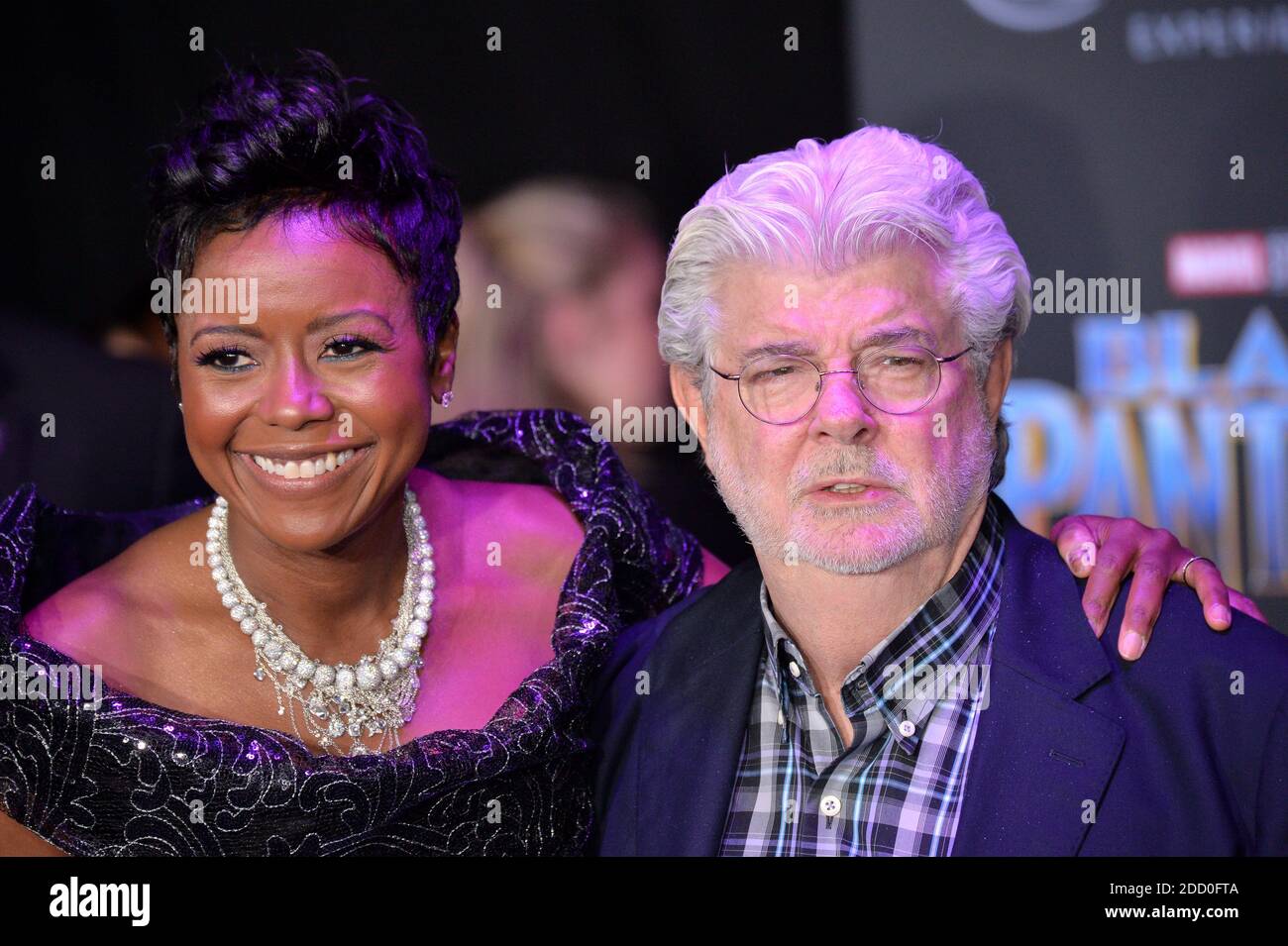 Mellody Hobson and George Lucas attend the premiere of Disney and