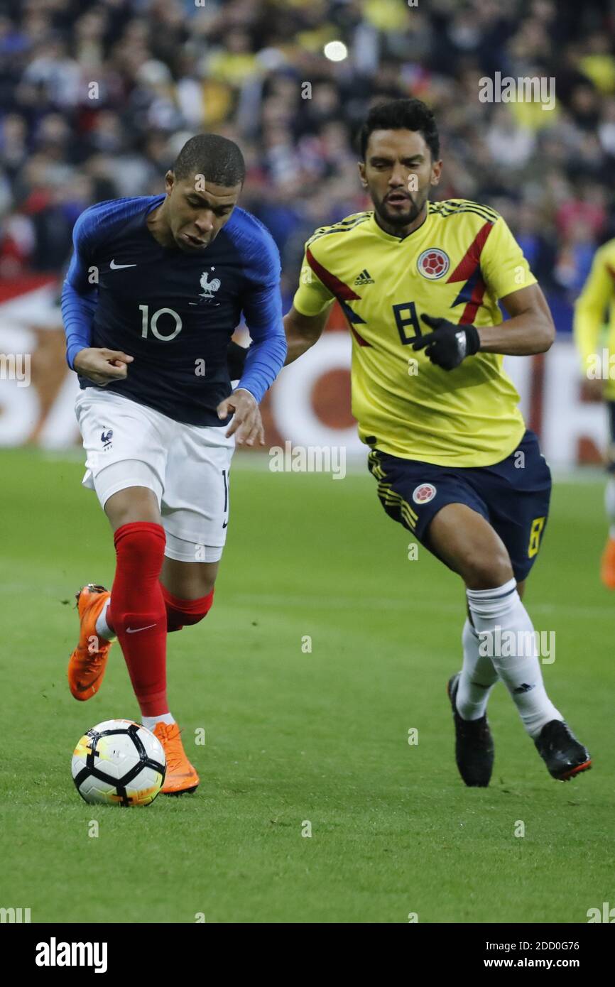 France's Kylian Mbappe battling Colombia's Abel Aguilar during France v Colombia friendly football match at the Stade de France stadium in Saint-Denis, suburb of Paris, France on March 23, 2018. Colombia won 3-2. Photo by Henri Szwarc/ABACAPRESS.COM Stock Photo