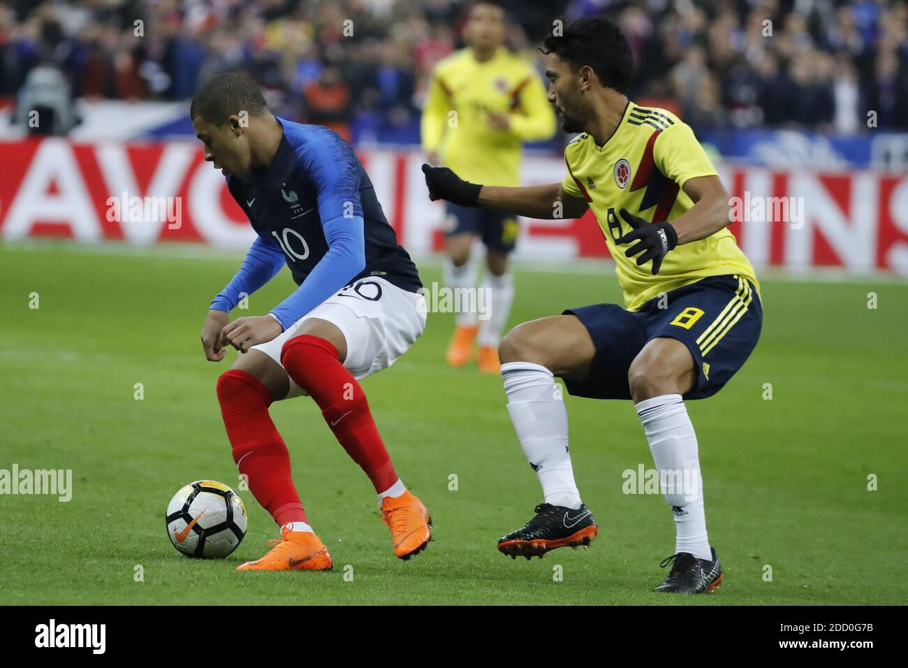 France's Kylian Mbappe battling Colombia's Abel Aguilar during France v Colombia friendly football match at the Stade de France stadium in Saint-Denis, suburb of Paris, France on March 23, 2018. Colombia won 3-2. Photo by Henri Szwarc/ABACAPRESS.COM Stock Photo