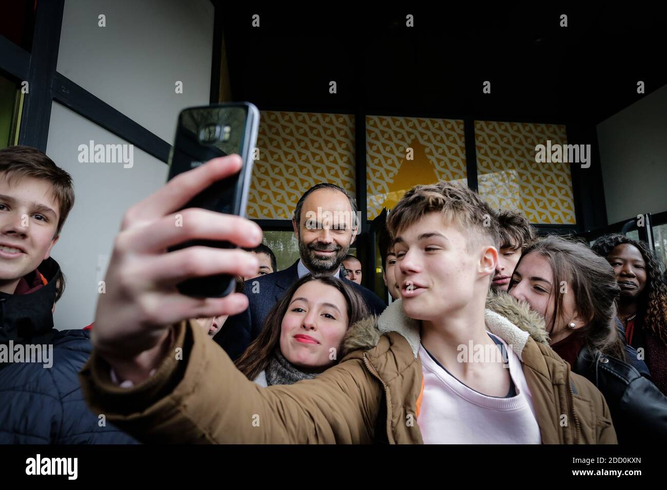 Prime Minister Edouard Philippe takes selfies with collegians waiting for him in front of the Astolabe mediatheque on the third day of the Matignon delocalization in the Lot in Figeac on December 15, 2017. Photo by Thibaud Moritz/ABACAPRESS.COM Stock Photo