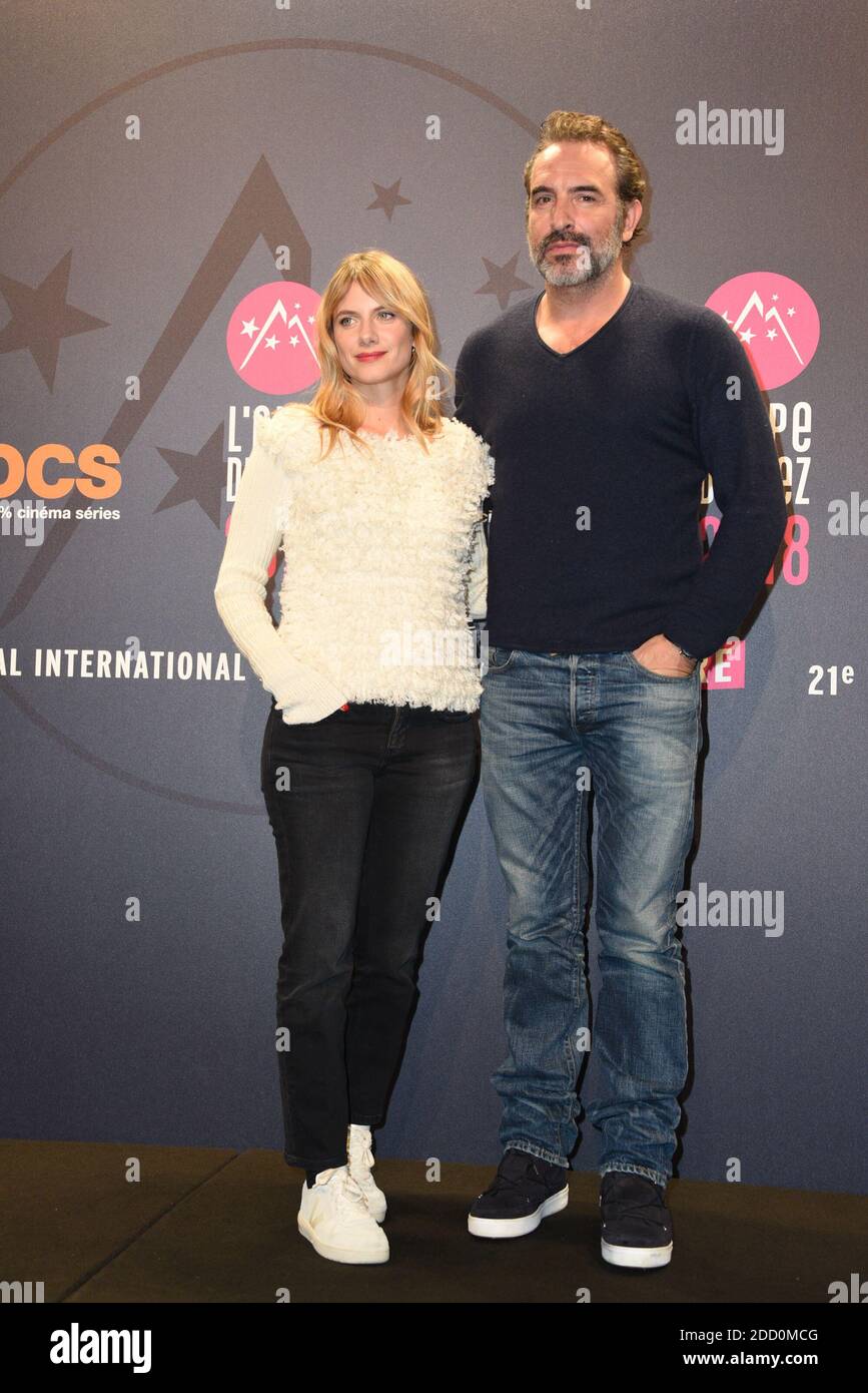 Melanie Laurent and Jean Dujardin posing for the photocall of 'Le retour du  heros' during the 21st Comedy Film Festival in L'Alpe d'Huez, France, on  January 20, 2018. Photo by Mireille Ampilhac/ABACAPRESS.COM