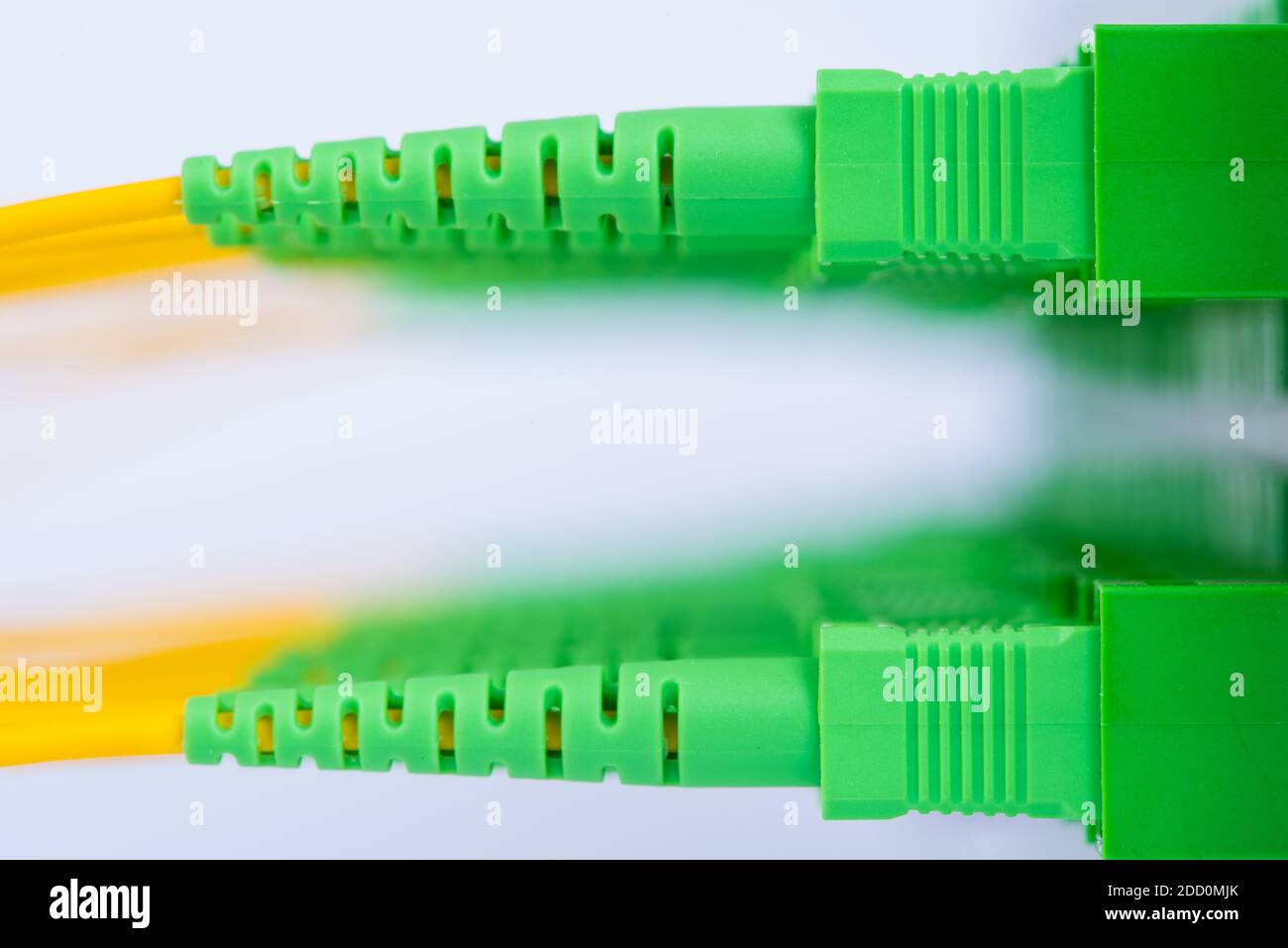 Fiber optic patch cord connected to distribution panel macro Stock ...