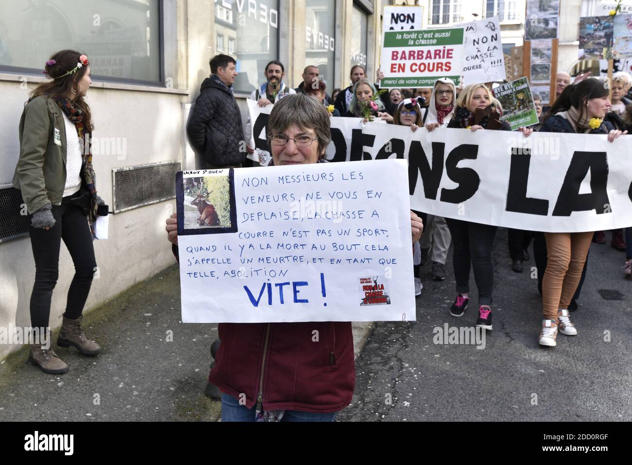 A thousand people from all over France take part in an anti-hunting with hounds demonstration, on March 31, 2018 in Compiegne, France. They respond to the call of collective AVA Picardie (Abolissons la Venerie Aujourd'hui). The AVA activists have been disturbing for several months hunting in the forest of Compiegne. Photo by Edouard Bernaux/ABACAPRESS.COM Stock Photo