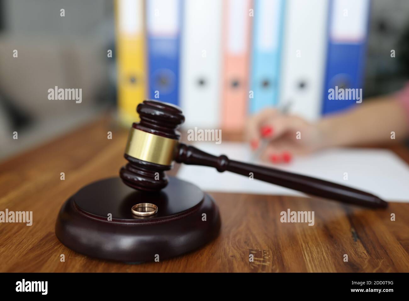 Wooden gavel for judge on stand is a wedding ring Stock Photo