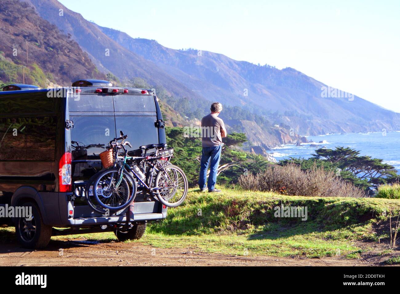 motor home tourist looks over  ocean  Pacific Ocean view at highway 1 in Big Sur calilfornia usa Stock Photo
