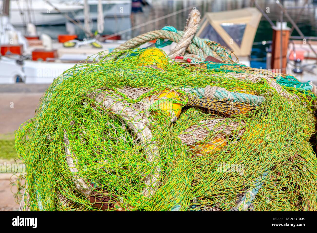 Pile of yellow fishing nets and rope hires stock photography and images Alamy