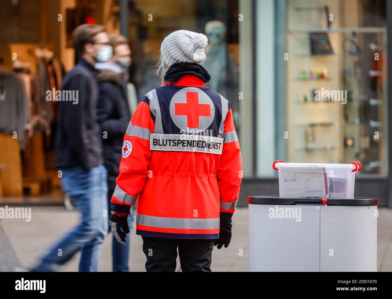 Essen, North Rhine-Westphalia, Germany - Employees of the DRK Blutspendedienst West stand at an information stand in the pedestrian zone and advertise Stock Photo
