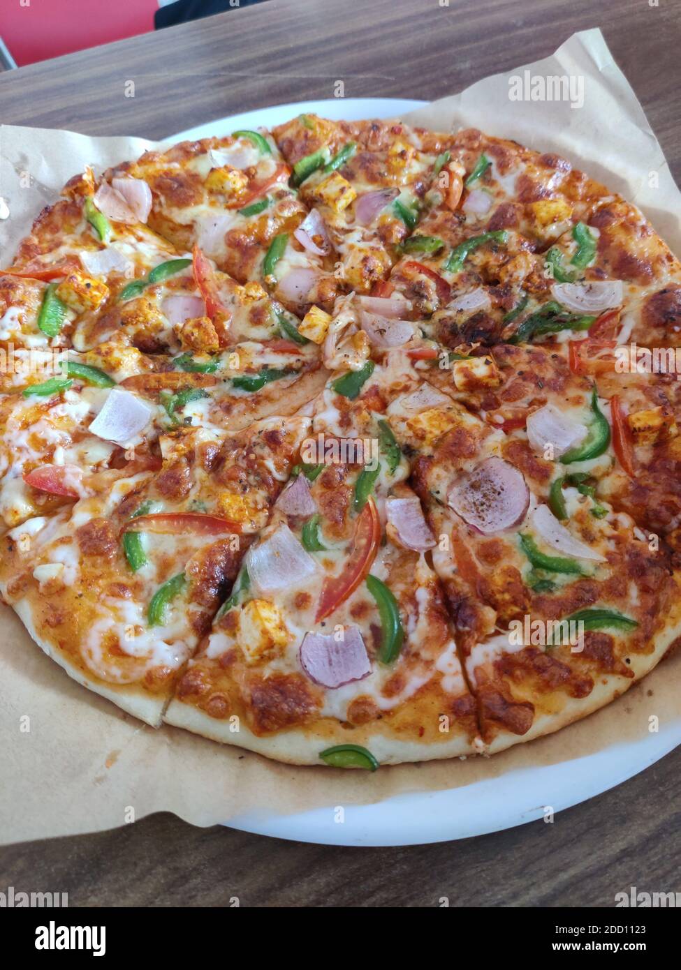 Paneer onion capsicum Pizza Photography Stock Photo