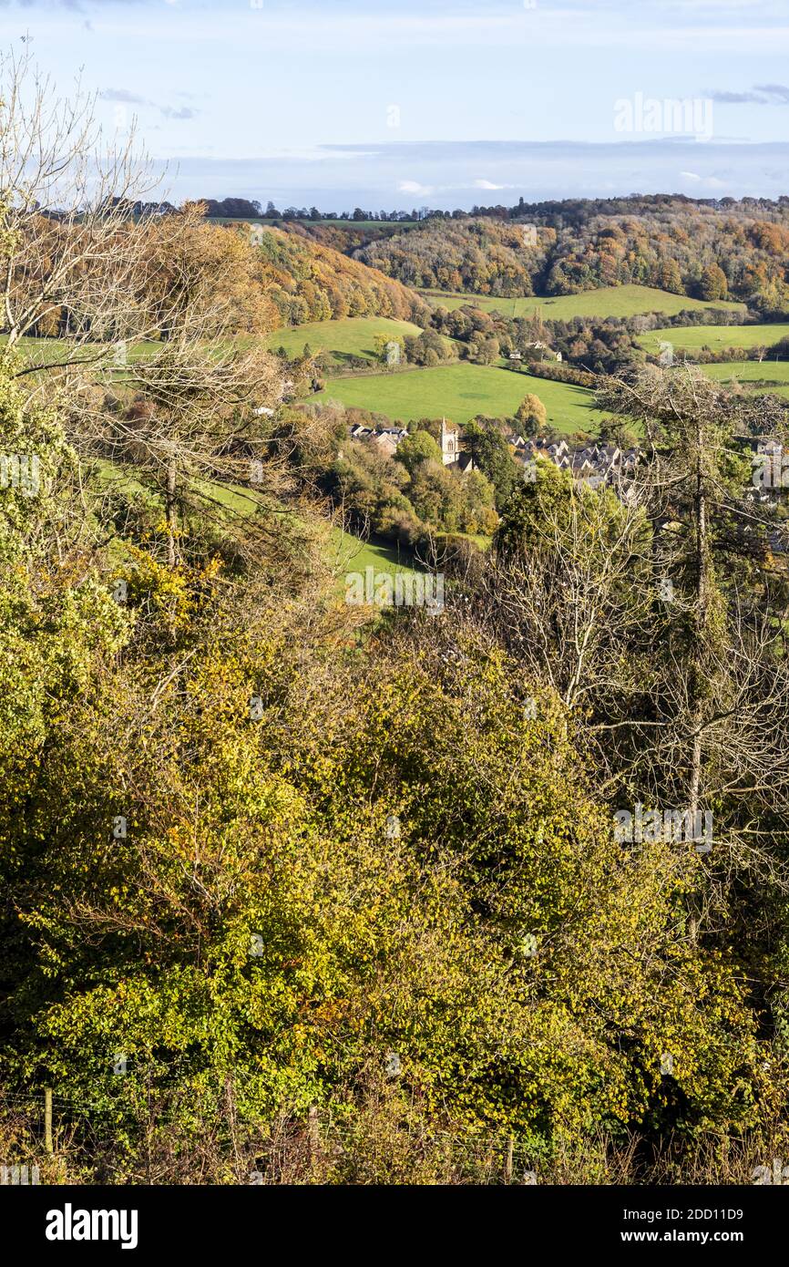 The village of Uley tucked in beneath the Cotswold escarpment viewed from Uley Bury, an Iron Age hill fort, Gloucestershire UK Stock Photo