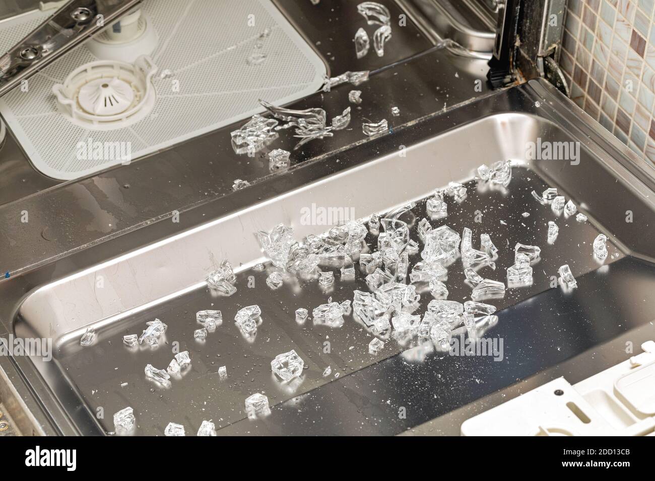 Broken Glass Pieces Shards in Dishwasher Machine Damage Stock Photo Alamy