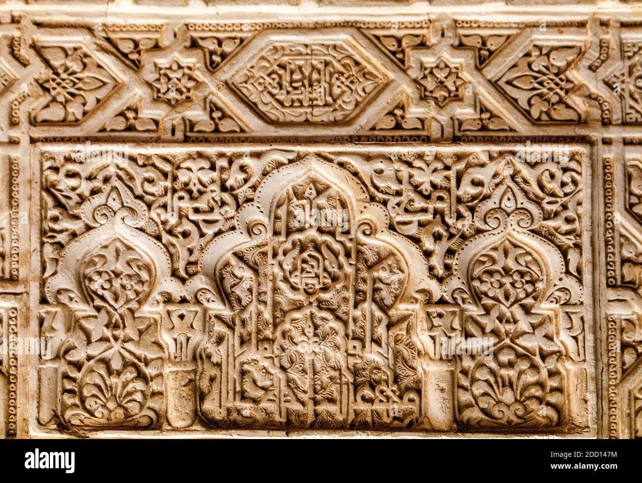 Intricate Moorish texture pattern, interior architectural feature at the historic Alhambra, Granada Spain Stock Photo