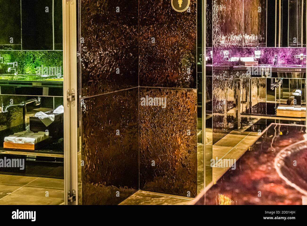 All that glitters is not gold! But at the Hotel Alàbriga it is. The sinks sparkle golden, shine blue or glow green, copper or purple. Sant Feliu de Guíxols, Spain Stock Photo