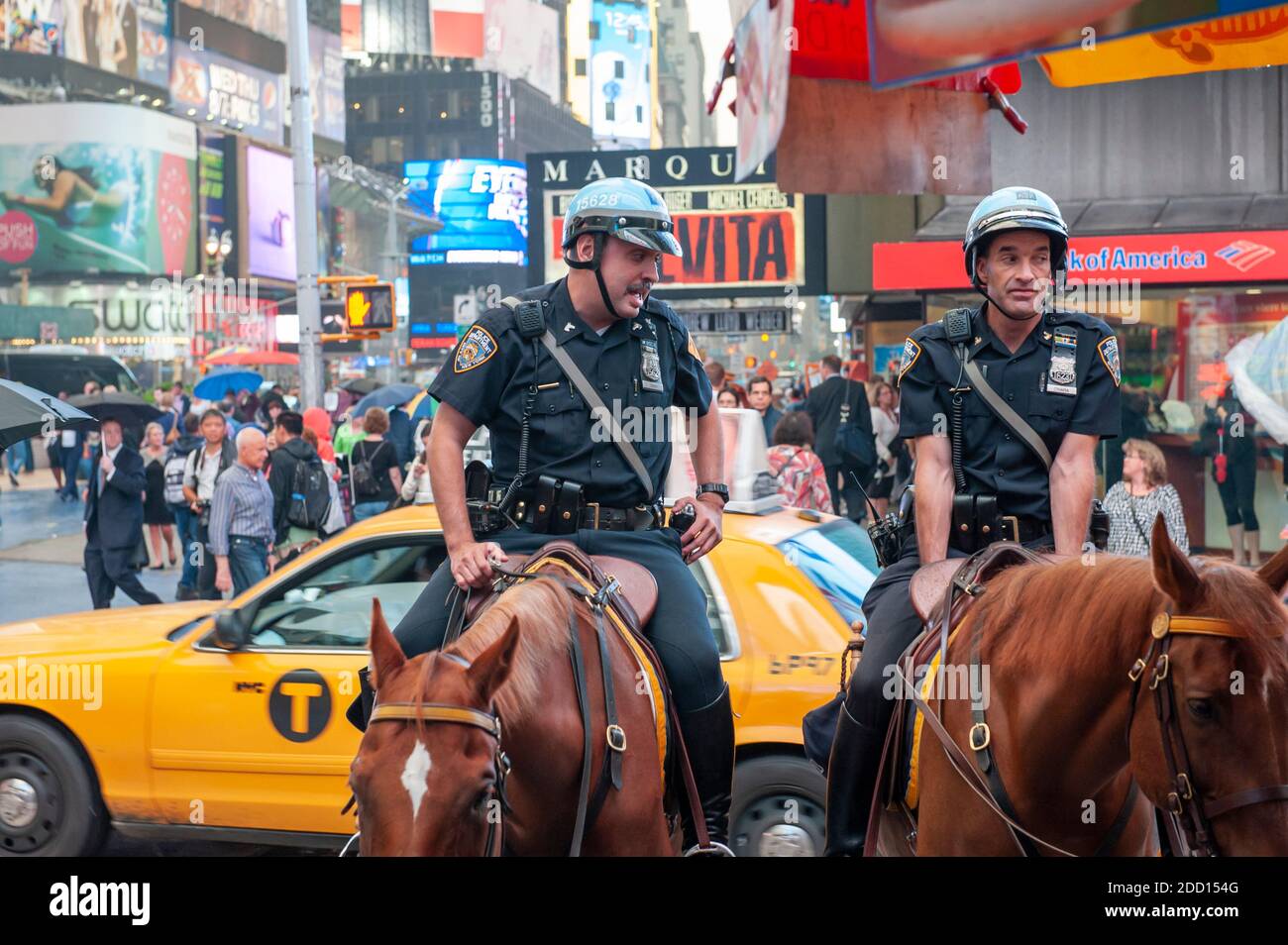 Two mounted NYPD officers in Times Square New York City Stock Photo - Alamy