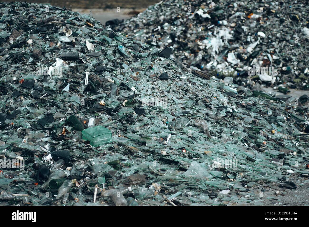 Closeup of glass garbage. Shards of broken glass on dump