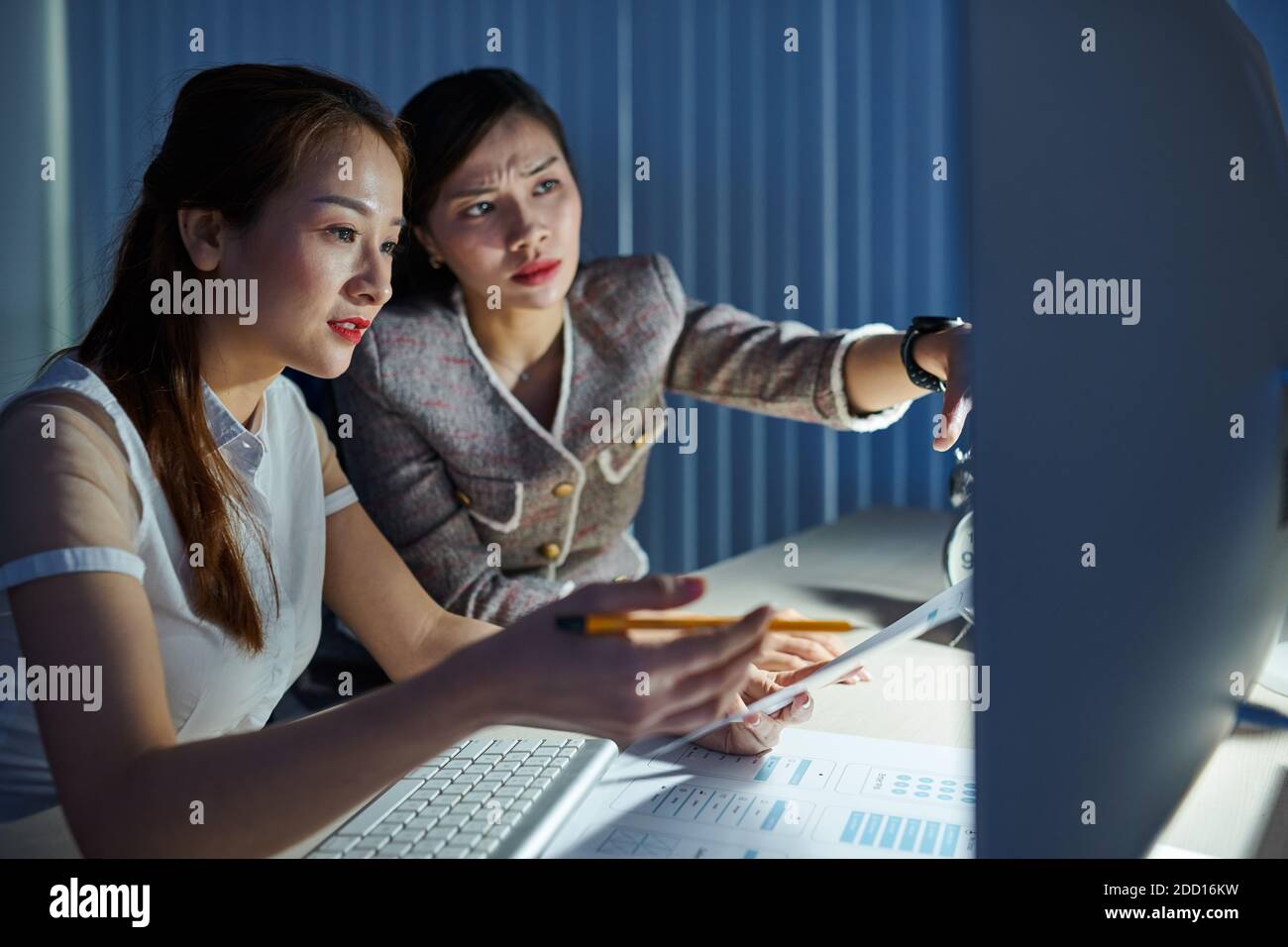 Discussing layout corrections Stock Photo - Alamy