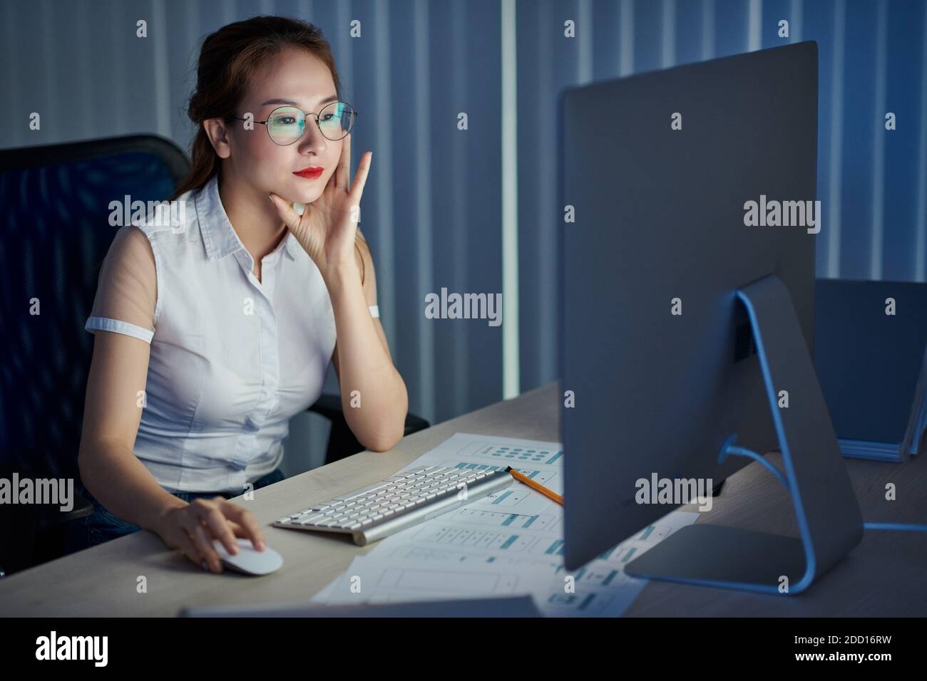 Project manager working at night Stock Photo