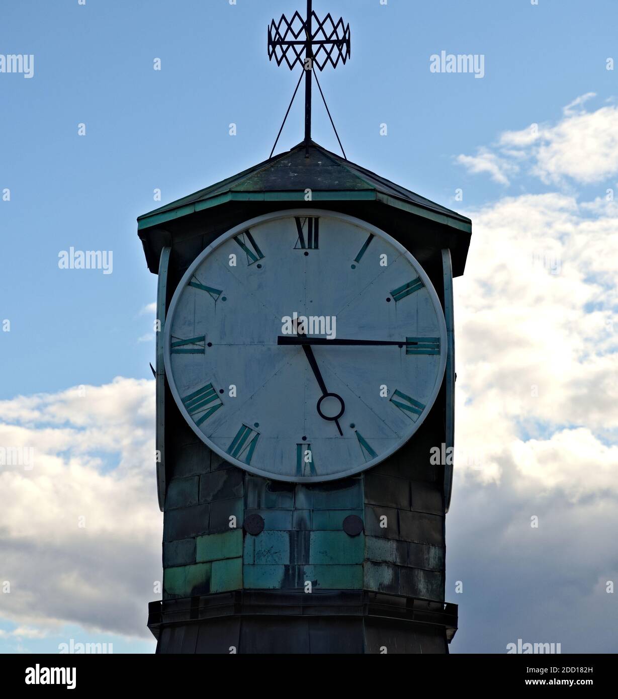 Old city clock tower at Aker brygge in Oslo, Norway. Looking weathered